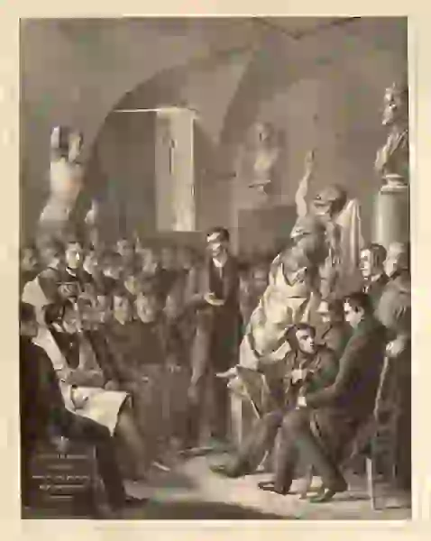 An anatomist lectures in a classroom before a partly dissected body propped up on a stand and suspended by his hand from a rope.